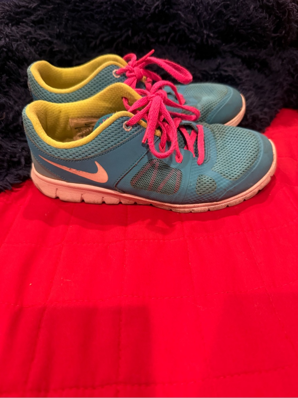 Nike Kids Blue Sneakers with Pink Laces and Yellow Lining